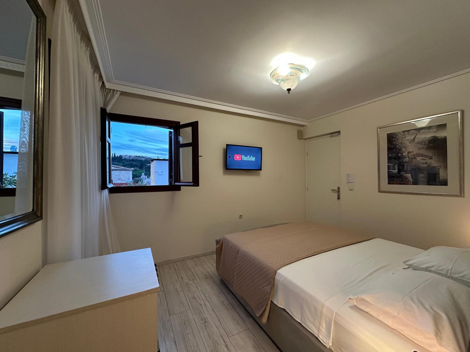 เทียซิส เอเธนส์ Bed & Breakfast ภายนอก รูปภาพ
